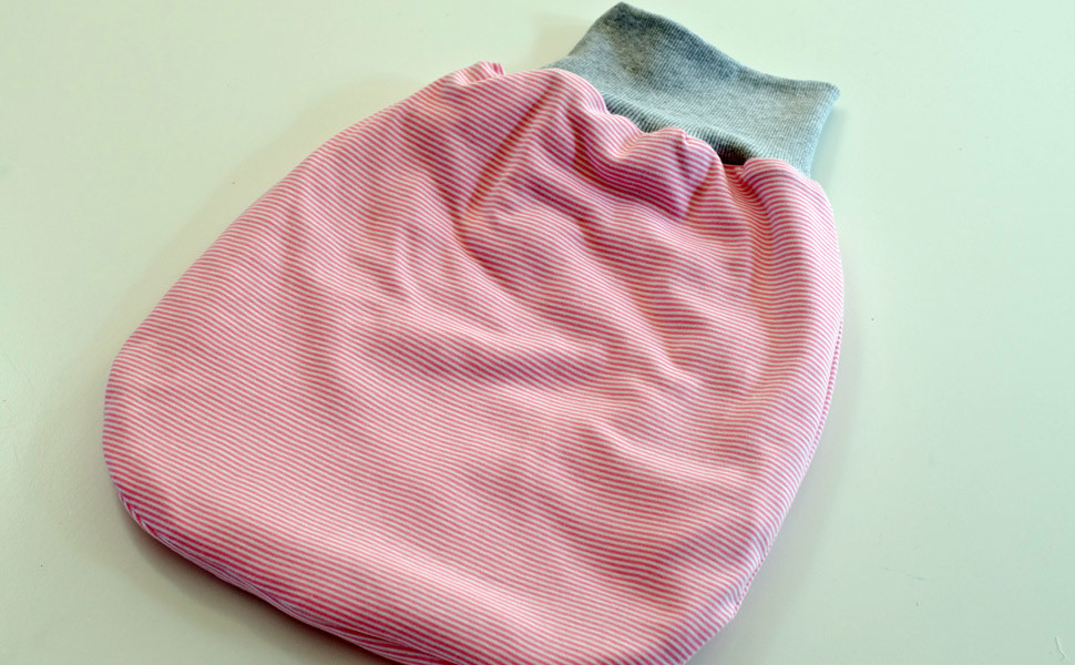 Особенности пеленки-кокона для пеленания новорожденных