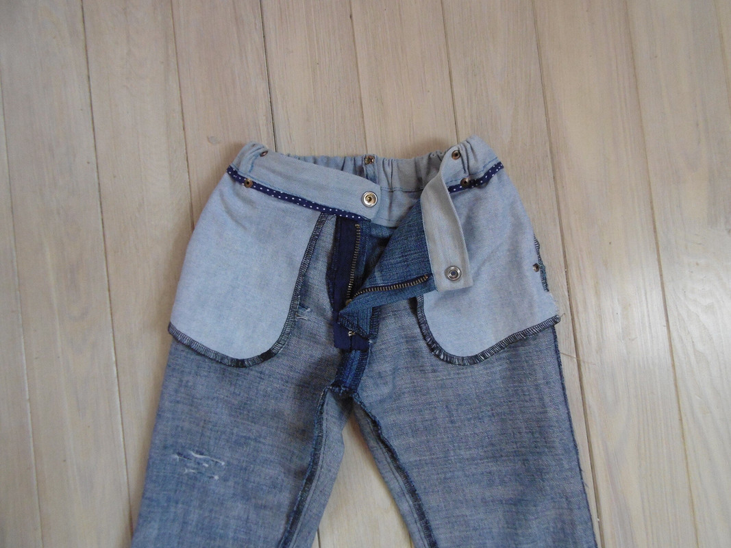 Рваные джинсы и свитшот с клеткой Бербери от Татти